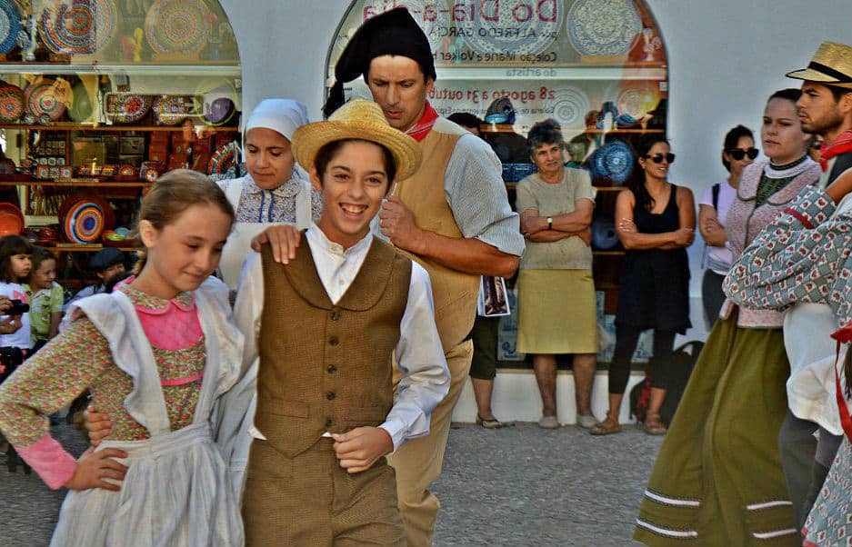 Children dancing traditional dance in Alrgarve, Loule, Portugal