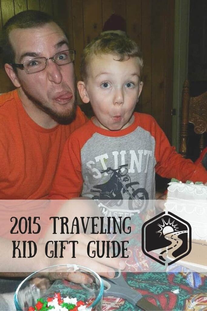 kid and dad building gingerbread house