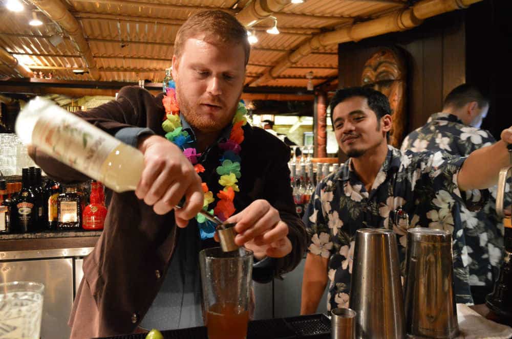 christian making mai tai at trader vic's in london