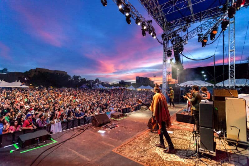 festival stage view sunset arizona by McDowell Mountain Music Festival