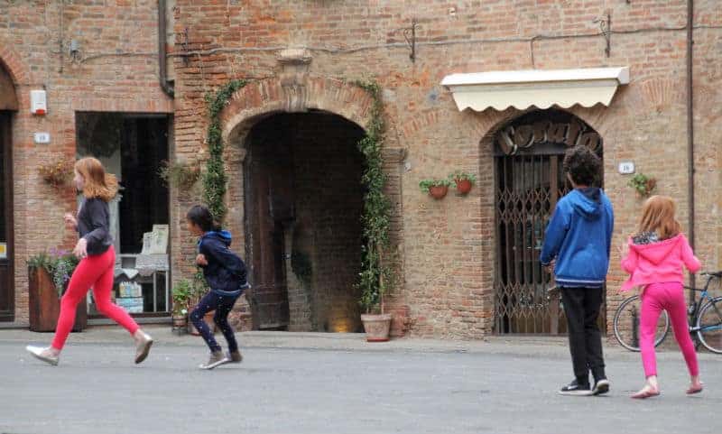 Kids in the Piazza Citta della Pieve italy