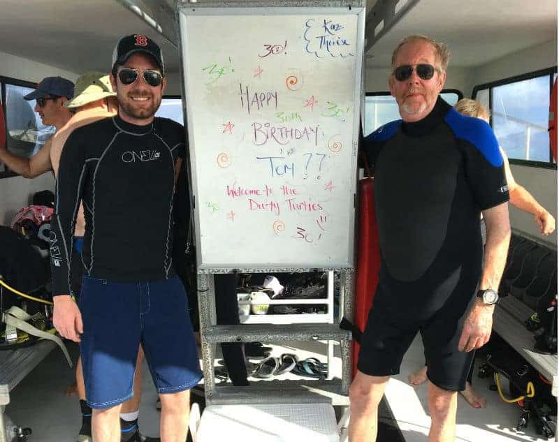 rick and tom with scuba diving board little cayman caribbean