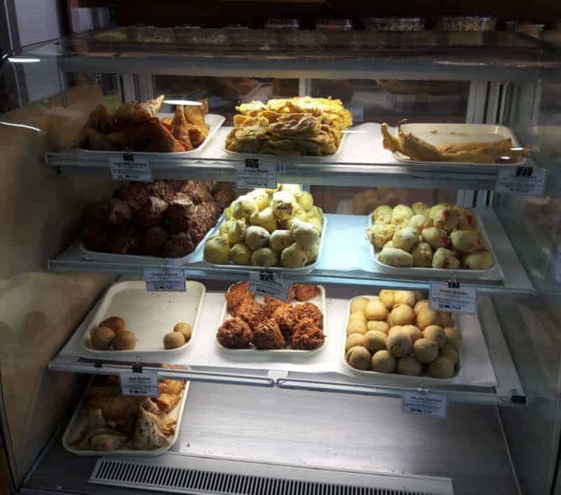 Display case of Hindo food at a vegan restaurant cardiff