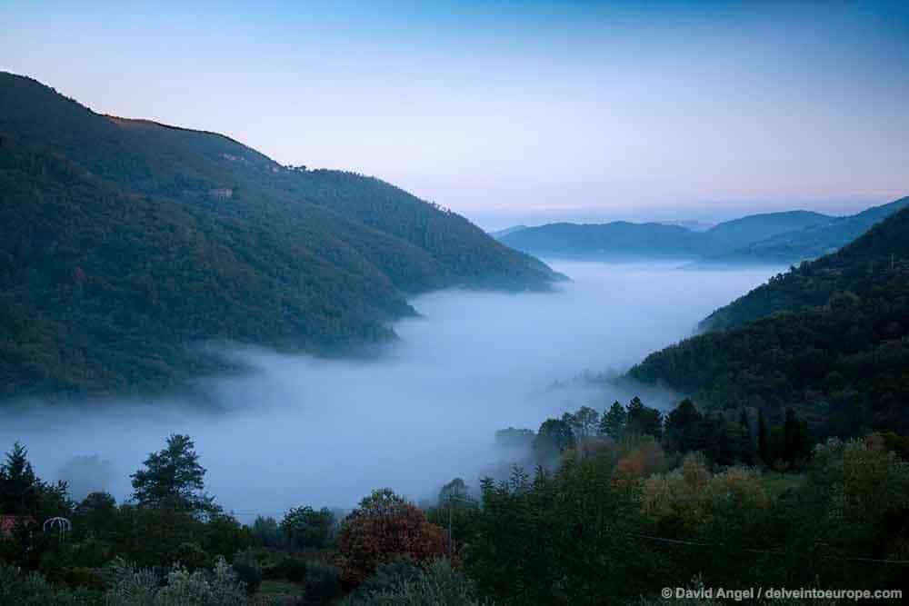 Tuscany Italy rolling hills and disk and mist