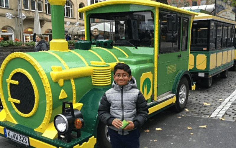 varshas little boy in front in train in germany