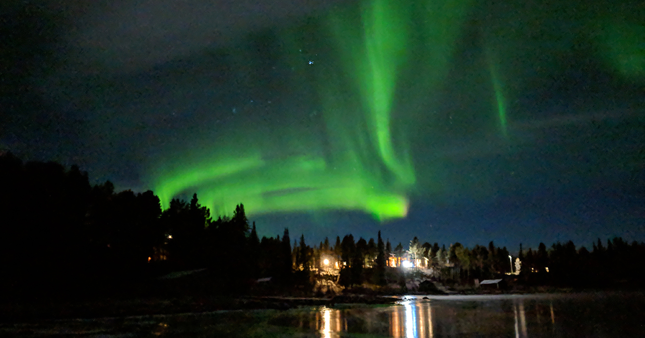 lapland northern lights lake view