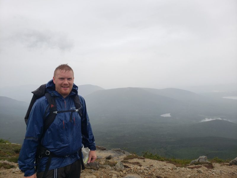 christian at the foggy summit of Katahdin Mountain in maine