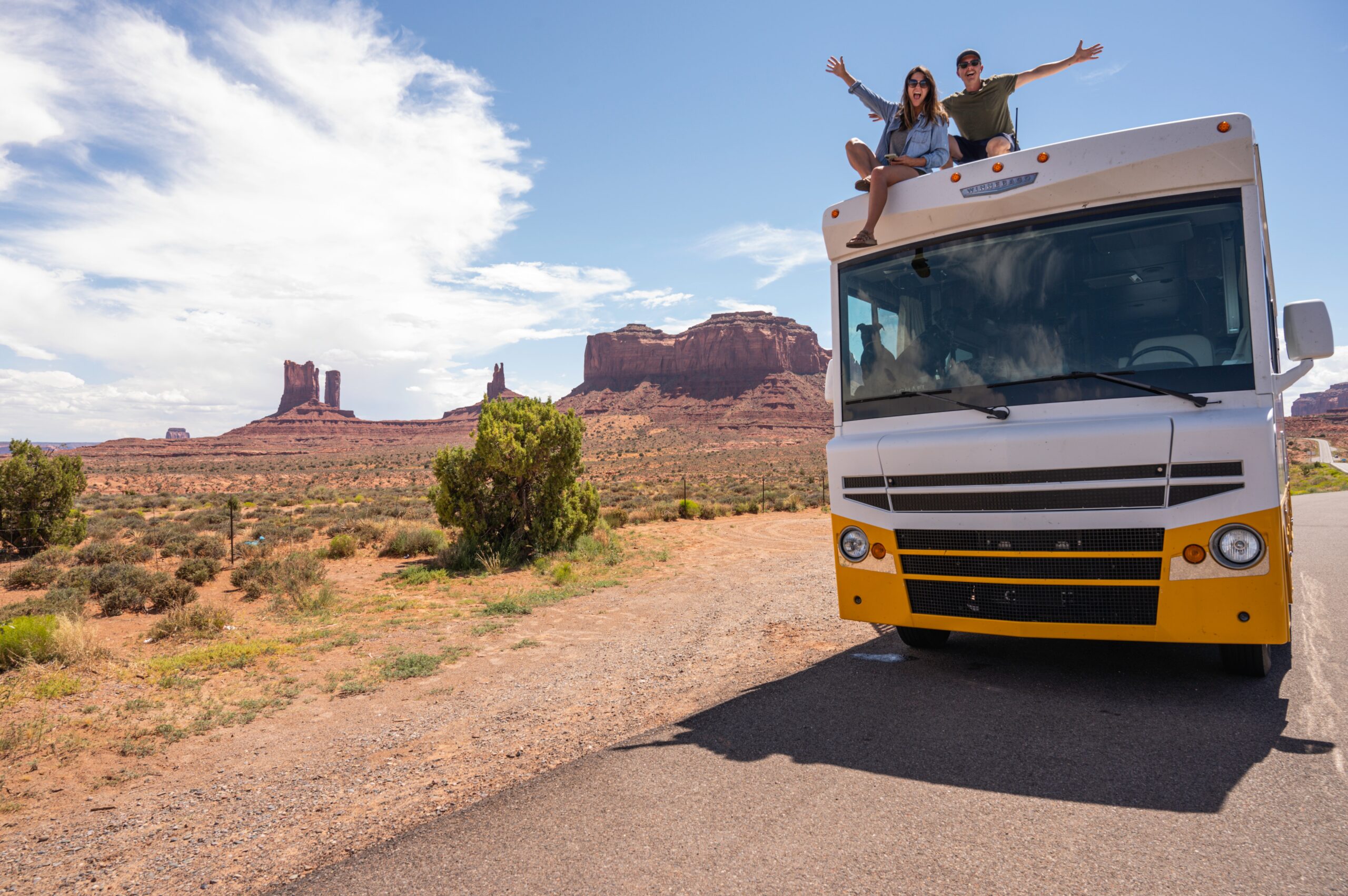 couple with vintage RV