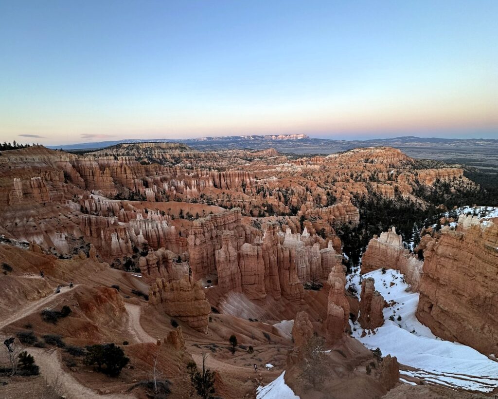 bryce canyon at sunset with snow